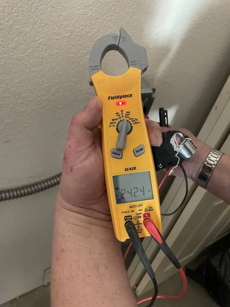 Voltage testing with clamp meter during Circuit Breaker Repair in Unadilla